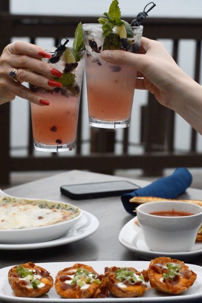 Cocktails served on the Bella Vista patio with outdoor riverview dining overlooking the Niagara River in Niagara Falls NY.